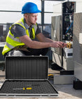 Technician using Rugged Aluminum Case With Foam Inserts Portable Hard Case Organizer For Tools And Gear while working on AC unit.