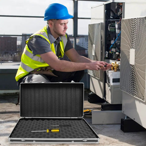 Technician using Rugged Aluminum Case With Foam Inserts Portable Hard Case Organizer For Tools And Gear while working on AC unit.