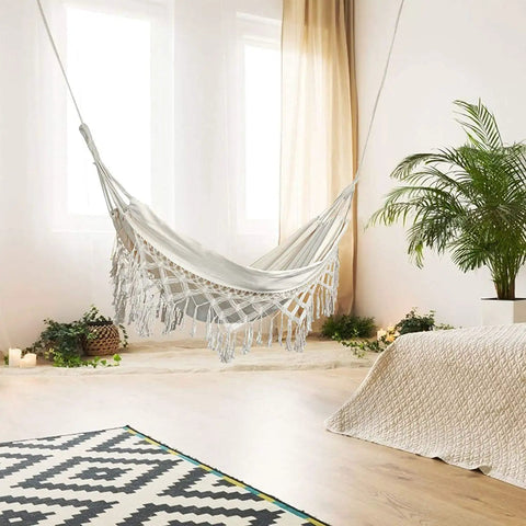 Indoor view of Brazilian Double Hammock With Soft Cotton Canvas And Fringe, Built For Two, Portable Outdoor Chill Vibe For Backyard Or Travel