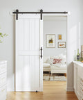 White Sliding Barn Door 30 By 80 Inches Made From MDF With Waterproof PVC Coating Pre Drilled Ready To Assemble Includes 5 Foot Black Sliding Door Hardware Kit And Handle H Frame Built To Last For Smooth Operation installed in a home