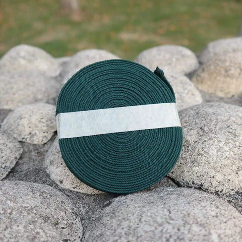 Durable Ito Sageo Wrapping Cord For Katana And Wakizashi 16.4 Foot Synthetic Silk Tsuka Ito on stone surface