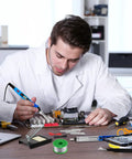 Person using Thirty Nine In One Soldering Iron Kit With LCD Display 80W 110V Electric Soldering Iron for electronics repair