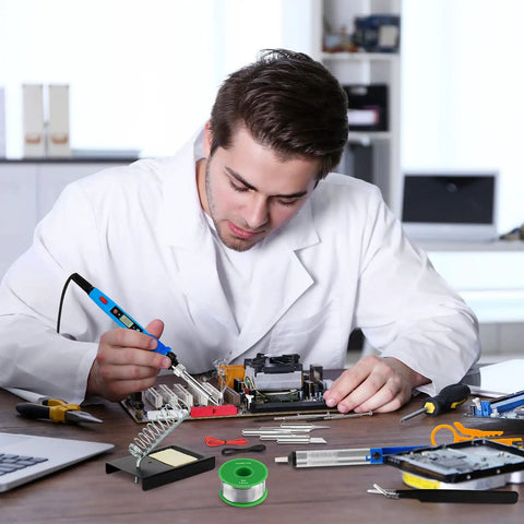 Person using Thirty Nine In One Soldering Iron Kit With LCD Display 80W 110V Electric Soldering Iron for electronics repair
