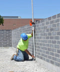 Person using One Sided Laser Detector With Clamp For Red Beam Rotating Lasers Outdoor Ready Visibility In Bright Sun Fast Signal Location
