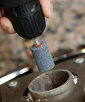 Close-up of rotary tool using Go To Mounted Abrasive Stone Set For Rotary Tool One Quarter Inch Shank Twenty Five Millimeter Diameter