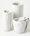 Items wrapped in 13 By 12 Inch White Packing Paper Sheets, 100 Count, for protecting fragile glassware and mugs during shipping.