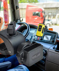 Heavy-Duty Motorcycle Walkie Talkie Mount for Bikes and ATVs in car interior, black ABS clamp on dashboard.