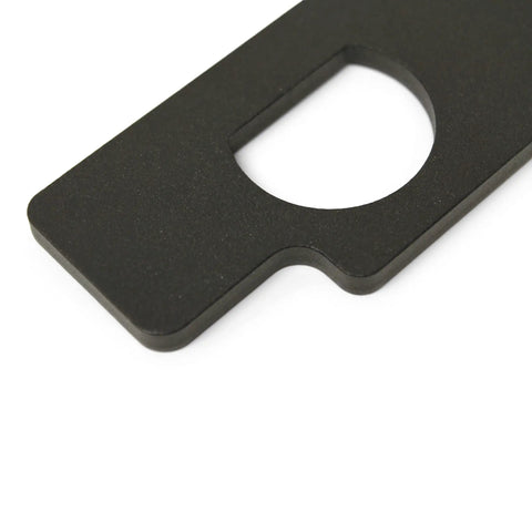 Pro Grade Camshaft Holding Tool For GM Inline Six Engines, CNC machined black steel part with circular cutout, durable design.