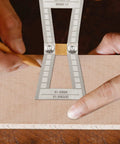 Top Tier Dovetail Marker And Joinery Guide With Dead Accurate Scale Marks marking precise lines on wood with pencil.