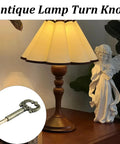 Lamp turn knobs, antique-brass 2-pack with 1/2-inch extension for table/floor lamps, front view