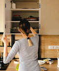 Person using kitchen cabinet with Hidden Slim Cabinet Latch With Ultra Thin Stainless Steel Hardware, Heavy Duty Magnetic Hold.
