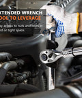Mechanic using Heavy Duty Wrench Extender For One Half Inch Drive And Twenty One Millimeter Hex Drive to boost leverage on engine.