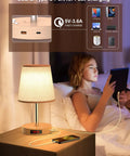 Woman reading by Lit LED Table Lamp With Touch Dimmer USB C Charging Ports Height Adjustable Bedside Nightstand Lamp