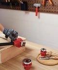 Ratcheting Pipe Threader Kit With Six Dies One Quarter Inch NPT To One And A Quarter Inch NPT Portable Pipe Threading Tool on workbench.