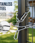 Stainless Steel Gate Chain Latch with Dual Carabiners for Fences secured on a black fence post in a garden setting.