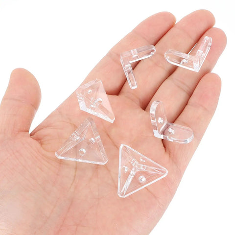 Real Deal 24 Piece Clear Acrylic Corner Bracket Kit features transparent L-shaped and cone connectors held in hand.