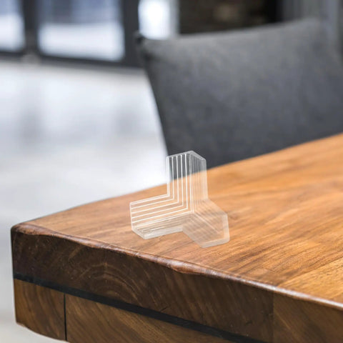 10 Pack Table Corner Guards For Kids And Pets, Soft PVC edge protectors on wooden table corner in modern living room.