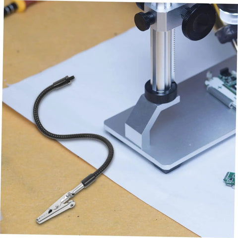 Close-up of a clamp with flexible arm next to a base from the Six Piece Flexible Third Hand Soldering Tool Set With Adjustable Arms PCB Holder And Magnifying Lamp For Precise Electronics Welding And Crafts Dope For DIY Projects Soldering Stations PCB Assembly And Detailed Electronics Work