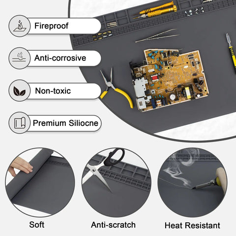 Extra Large Soldering Mat With Wrist Strap And Grounding Accessories, 23.6 x 13.8 Inches, shown with tools and pcb on gray surface