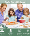 Front view of kids using a 20-piece Amazon Kids Safe Knife Set toy in a family kitchen with a wooden cutting board.