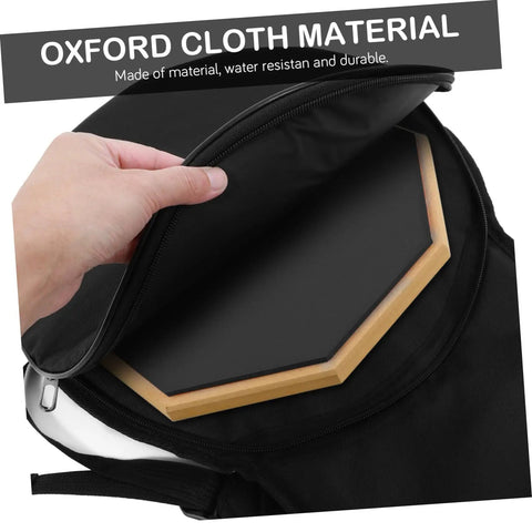 Lock Down Your Percussion Rig With This Straight Up Tough Oxford Fabric Dumb Drum Storage Bag And Snare Accessory Pouch showing water-resistant interior with drum pad inside.