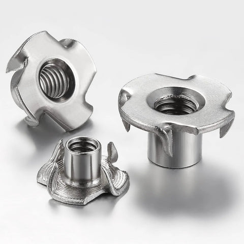 Three 1/4-20 304 stainless steel four-jaw T-nuts with threaded holes for wood inserts.