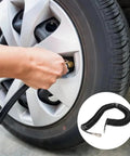 Using Top Shelf Heavy Duty Retractable Air Hose Compressor Hookup With Kink Free Bend Limiter For Fast Tire Inflation.