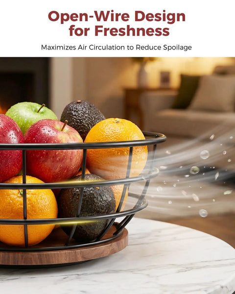 Smooth Spinning 360 Degree Rotating Fruit Bowl With Hefty Capacity Deep Basket And Solid Banana Stand For Kitchen Counter Organization And Absolutely Slick Everyday Utility showcasing fruits in an open-wire design.