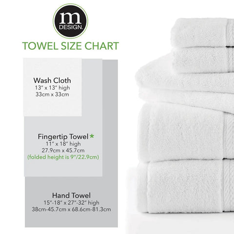 Stack of towels with mDesign towel size chart showing measurements for wash cloth, fingertip towel, and hand towel.