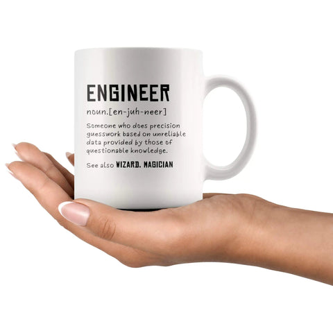 Engineer Definition Funny Gift Mug For Engineering Students Teachers And Pros Nerdy Computer Civil Mechanical Electrical Software Engineers 11 Oz White Ceramic Coffee Mug held in hand