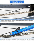 Close-up of All-In-One Bike Chain Wear Gauge And Checker Tool measuring chain stretch on a bike, blue aluminum alloy.