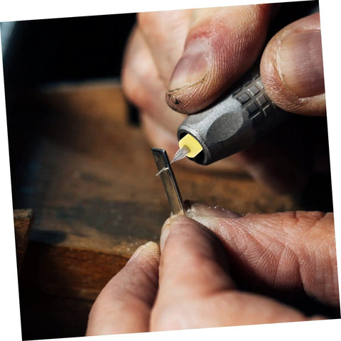 Person using 30 Piece Tiny Drill Bits For Jewelry Making And PCB Engraving Tungsten Steel Micro Drill Bit Set on metal piece