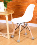 Bulk 500 Pack Precut Tennis Ball Chair Leg Caps 2.5 Inch Gray Floor Guards on a chair gliding over wood floor.