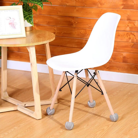 Bulk 500 Pack Precut Tennis Ball Chair Leg Caps 2.5 Inch Gray Floor Guards on a chair gliding over wood floor.
