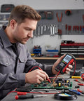 Technician using USB Rechargeable Digital Multimeter With True RMS And 6000 Counts, Color LCD Screen for circuit testing