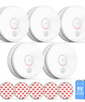 Four Heavy Duty Ten Year Life Smoke Detectors with 9V battery replacements for residential security and fire alerts.