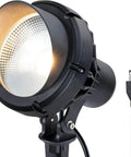 Close-up of 40W LED Outdoor Spotlight Plug In 120V 4000LM Warm White 3000K Landscape Lighting with visible cord and plug.