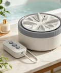 Compact Mini Washing Machine Portable USB Powered Clothes Washer with control panel on a tabletop near a plant.