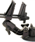 Kickass Vacuum Bench Vise For Smooth Workbenches With No Sweat Clamping Mechanism Featuring Low Key Tilt Rotate Knobs Beefy Grooved Jaws Perfect For Delicate Hobby Crafts And Circuit Repair Black mounted on a flat surface.