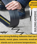 Flexible strip installation with building adhesive on concrete surface, adhesive not included