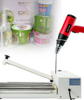 Heavy Duty 2 In 1 Shrink Wrap Machine And Heat Sealer 800W Adjustable Speed Packaging Rig with heat gun and film rolls.