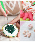Six Piece Cookie Scribe Tool Set Featuring Durable Iron Pins And Comfortable Plastic Handles For Flawless Sugar Cookie Decorating in use on decorated cookies.