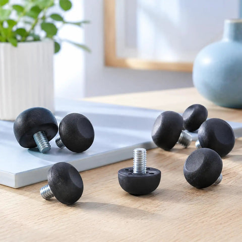 Rock Solid Adjustable Furniture Levelers Built From Tough 304 Stainless Steel And Heavy Duty Screw In Table Feet for wobbly chairs or desks on a wooden surface.