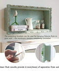Built Like A Tank Aluminum French Cleat Picture Hanger 18 Inch Set with smooth shelf holding decorative items on wall.