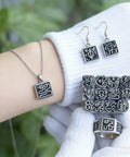 Portable Metal Stamp Kit With Chinese Zodiac Pattern Stamps for Jewelry Making, featuring tiger design on necklace and ring.