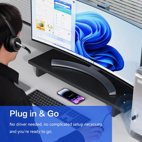 Person using Wireless Headset With Microphone For PC And Phone, V5.2 Noise Cancelling Mic, at desk with curved monitor and phone