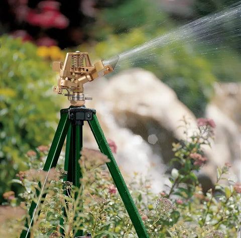 Beefed Up Heavy Duty Zinc Tripod Impact Sprinkler With 360 Degree Rotation And Adjustable Height High Pressure Nozzle in garden