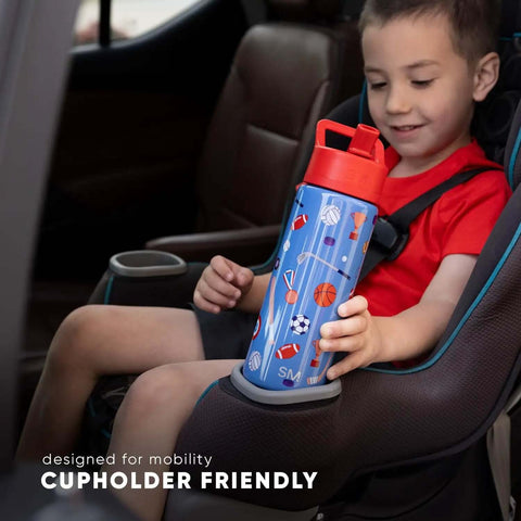 Child holding Disney Princess 14oz Kids Water Bottle With Straw Lid Insulated Stainless Steel Tumbler, cupholder friendly design.