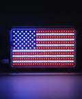 Illuminated 0.3x0.5 ft American Flag with 1206 SMD pads in acrylic shell, part of the American Flag DIY Soldering Project Kit With Compact Acrylic Shell For Hands On Electronics Learning 0.3 By 0.5 Ft PCB Featuring 1206 SMD Pads For Easy Practice On A Stable Desk Display.