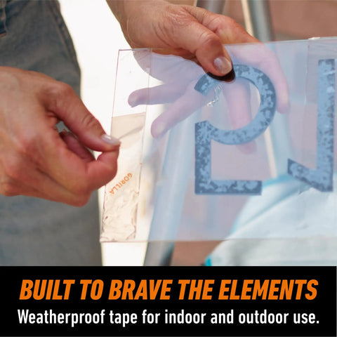 Person applying Crystal Clear Mounting Tape With Instant Bond Pack Of 2 1 Inch By 60 Inch Double Sided for mounting a sign